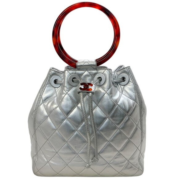 Chanel Vintage Silver Lambskin Drawstring Satchel with Tortoise Circle Handles - Picture 1 of 11